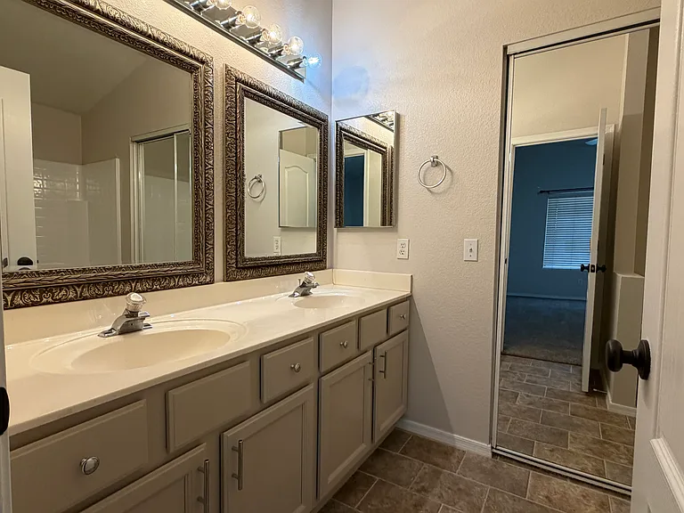 Primary Bath freshly refinished, large walk-in closet
