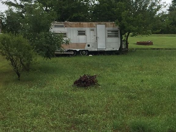 Small camper on lot