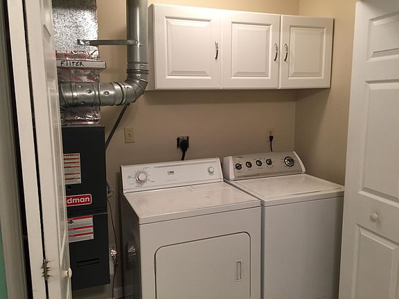 Laundry Room with Storage Cabinets