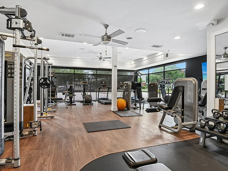 Markethaus 3700 A gym with a variety of equipment including weights and cardio machines.