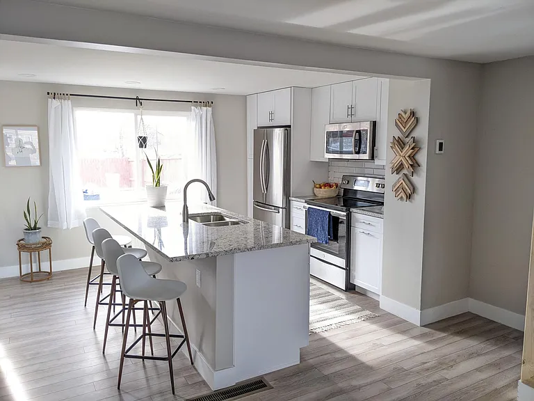 Kitchen with open floor plan and lots of natural light