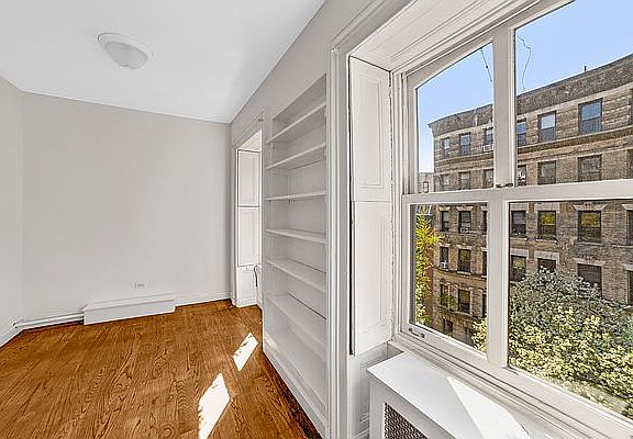 5th image of 128 E 10th St APT 4