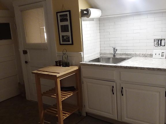 New counter, sink and backsplash,recessed lighting