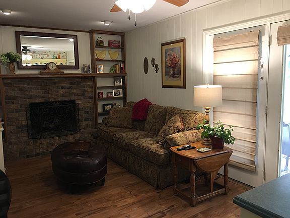 Den with ceiling fan