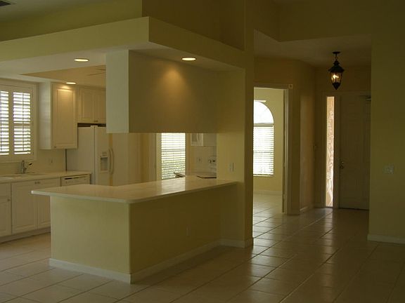 entry foyer leads to open Kitchen etc