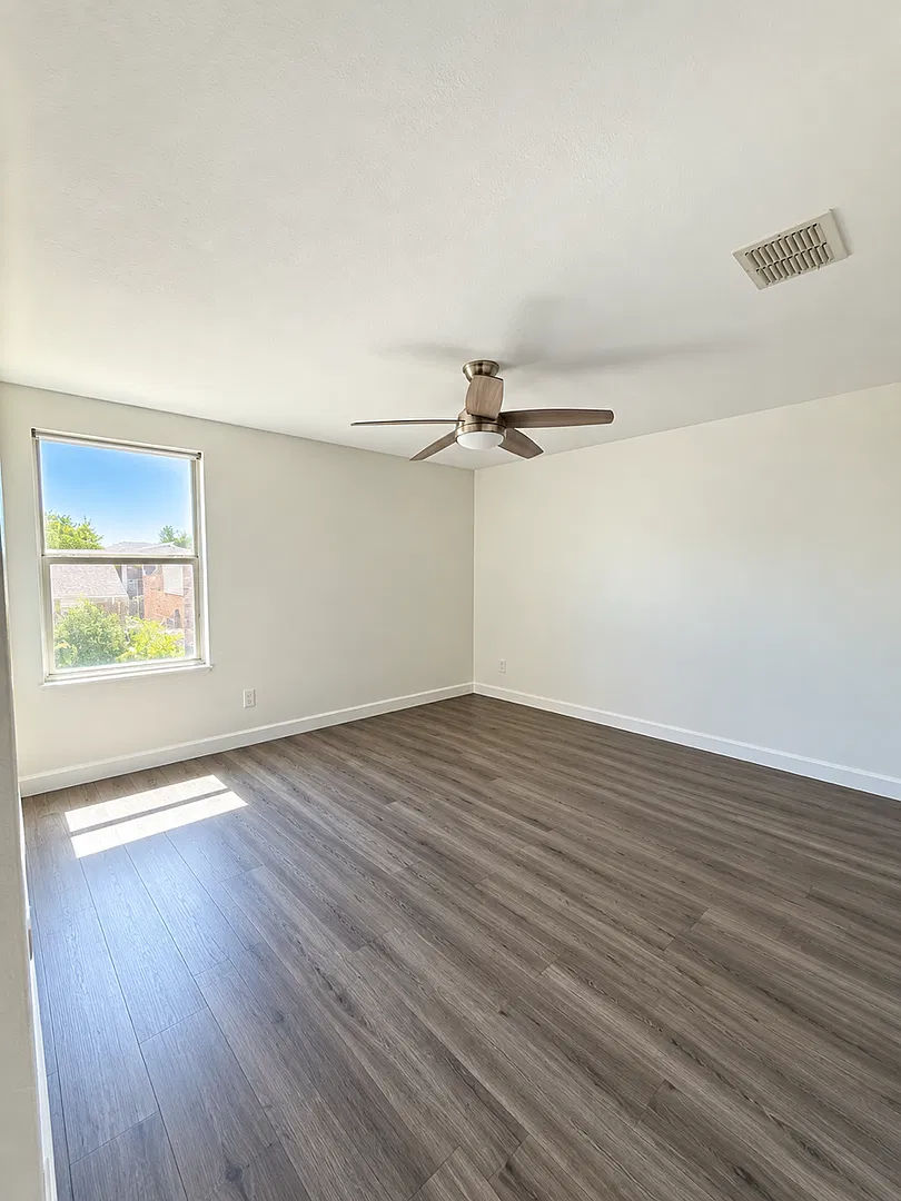 Inviting Fort Worth Home with a Fenced Backyard & Covered Patio — Photo 4