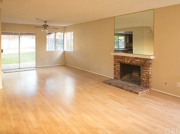 The Living Room Area w/Fireplace.