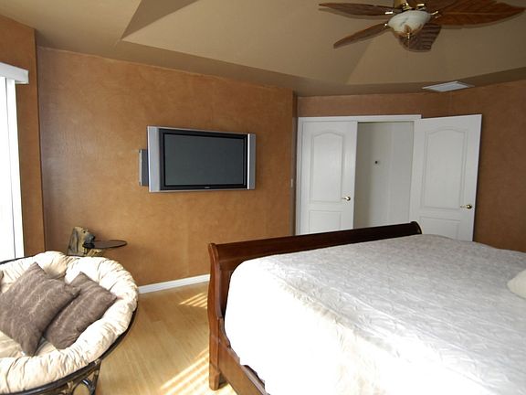 Master has wall mounted TV Included