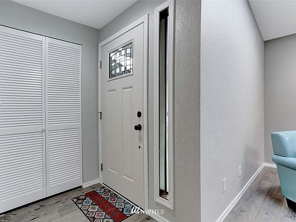 Bright entry with guest closet opens to the Great Room