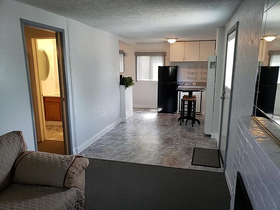 Dining area/Kitchen from Living room area Bedroom 1 on left