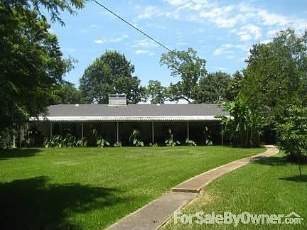 Back Yard view : A view of our home from the area of the shop and storage building