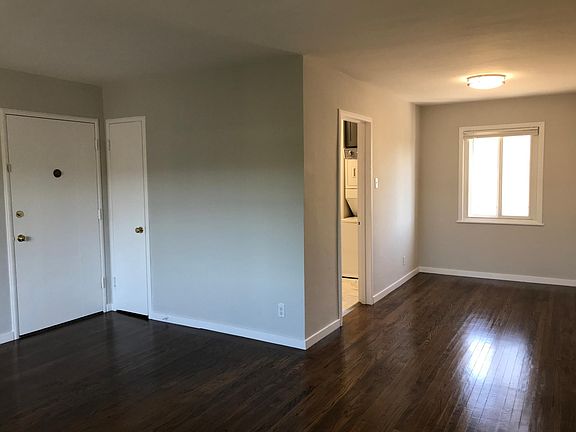 Living room looking to dining room and kitchen