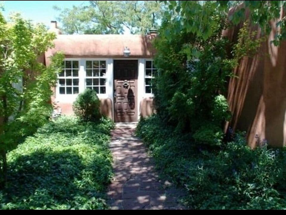 Front door is reached through a lovely courtyard.