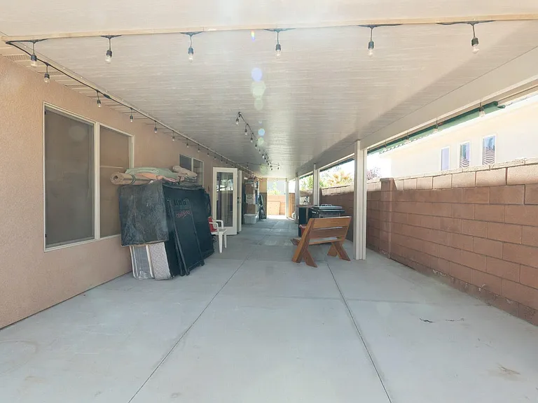 Covered, with insulated roof backyard space