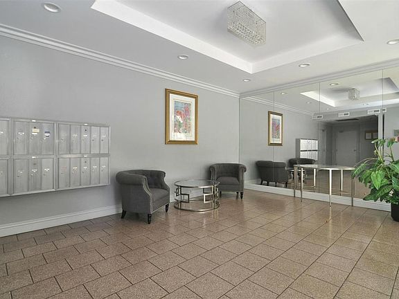 Ground Level: garage, lobby, mailbox area, elevator to 1st,