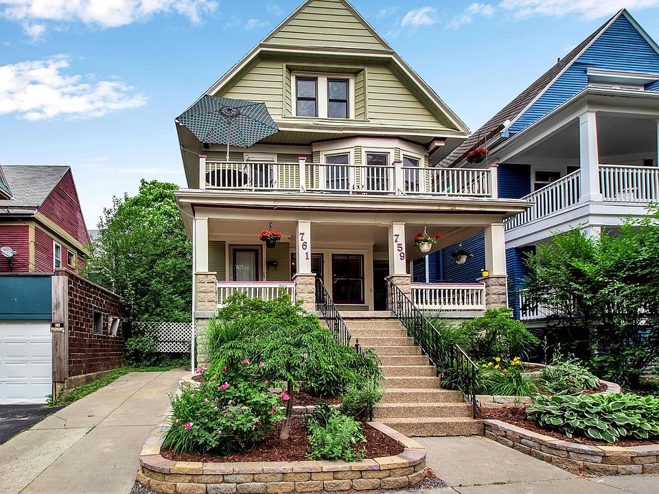 House has recently been re-painted a blueish gray