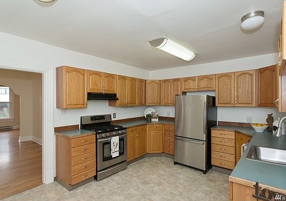 Lots of space in this kitchen with newer stainless steel appliances