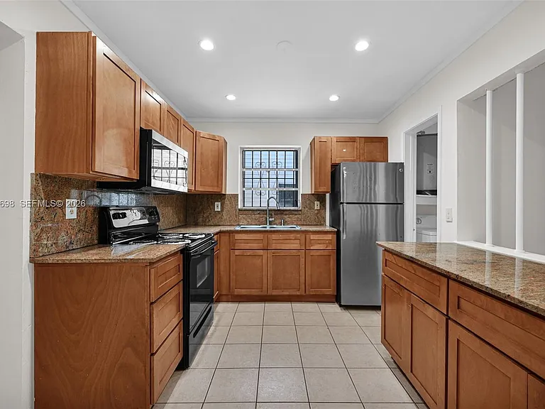 244 NW 43rd St — Photo 4