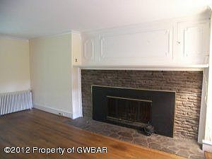 LIVING ROOM ORIGINAL STONE FIREPLACE