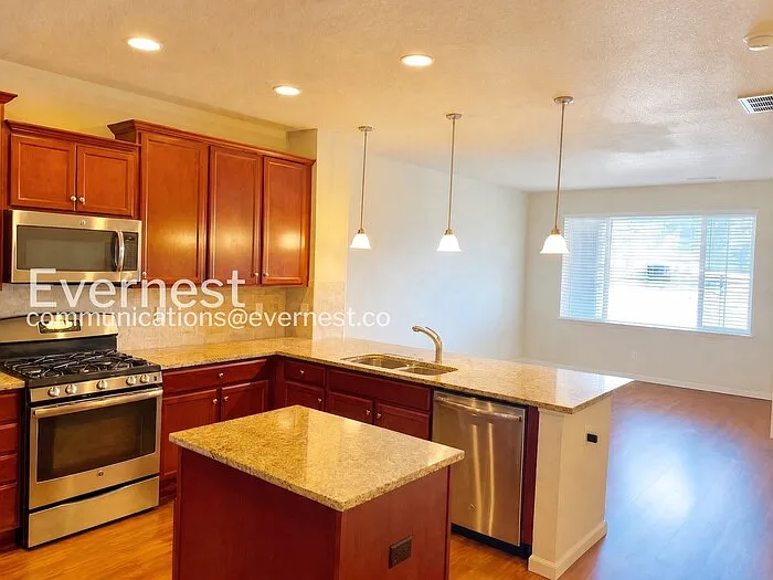 9086 E Phillips Ln — Photo 5