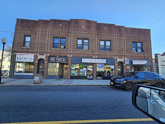 Front of building. Apartment for rent is 2nd floor end unit.