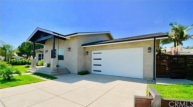 WELCOME TO THIS CUSTOM CONTEMPORY ONE LEVEL RANCH COMPLETED IN AUGUST 2019