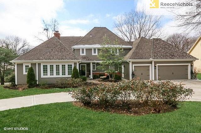 Fabulous front of home with circle drive!