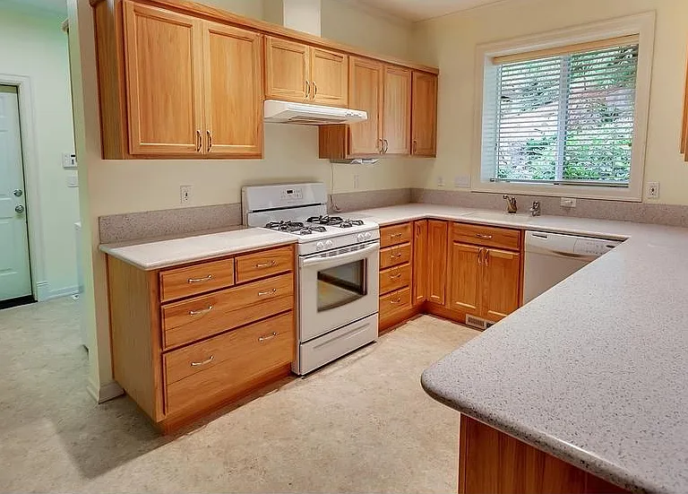 Full kitchen with stove, oven, range hood and dishwasher