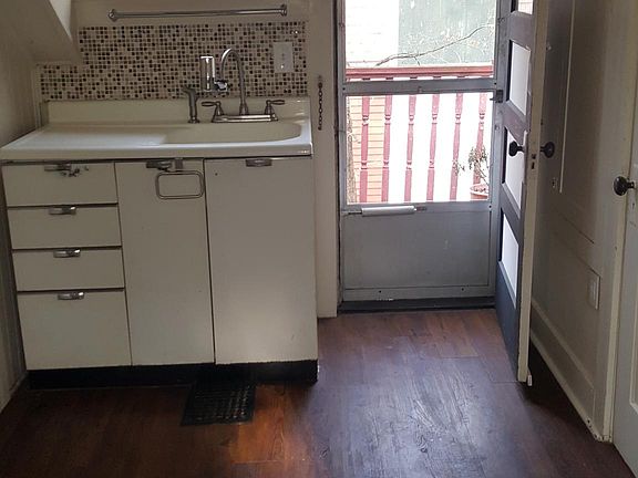 view of kitchen. with outdoor small porch access