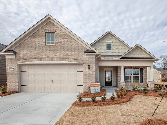 Castle Rock Exterior 8 features brick, shakes and covered front porch