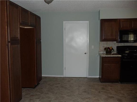 4th image of 6900 E 129th St