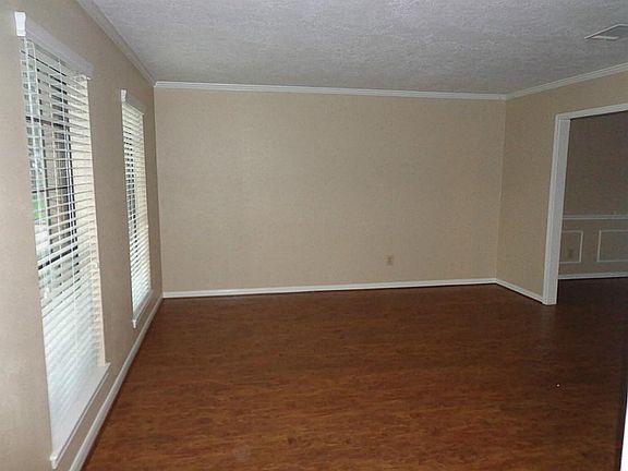 Formal living room with great windows and new floors