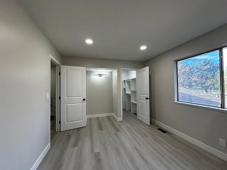 Walk-in closet with custom organizers!