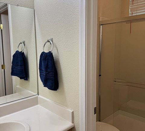 Full bathroom in the first floor next to the den