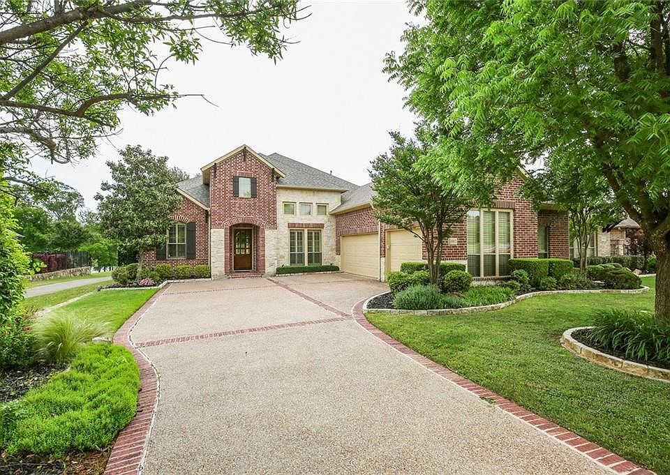 Beautiful drive up on the gold course custom home.