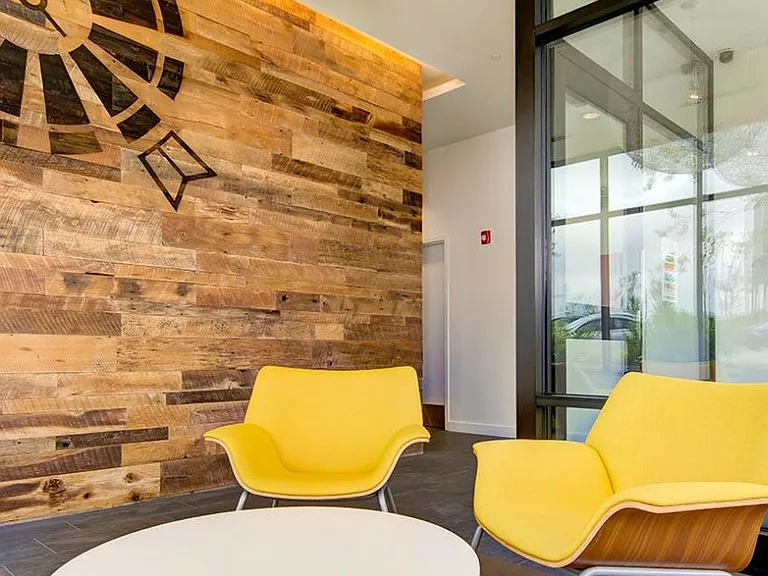 Welcome to Farmers Park Apartments, where modern elegance meets cozy comfort. Enjoy stylish interiors highlighted by natural wood accents and vibrant furnishings. Your ideal living space awaitsschedule your visit today!