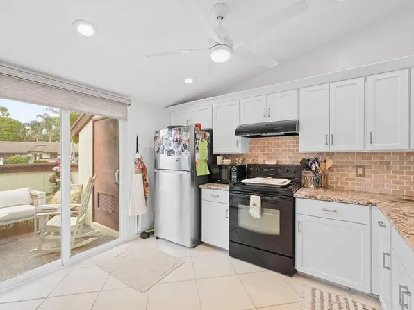 497 Iron Forge Court, Royal Palm Beach, FL 33411