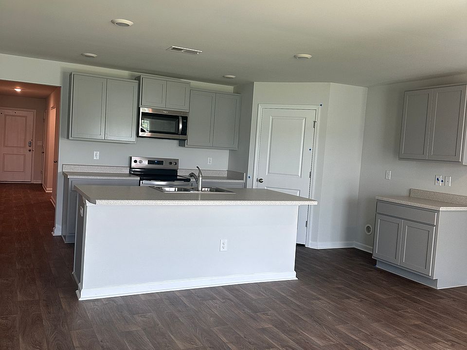 Open floor plan kitchen that has a beautiful water view