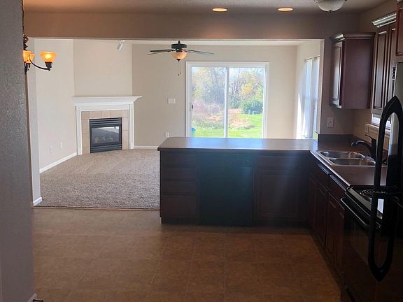 Entry, looking into the Kitchen and Living Room