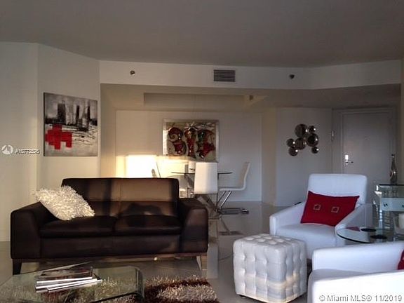 5th image of 3600 Mystic Pointe Dr APT 816