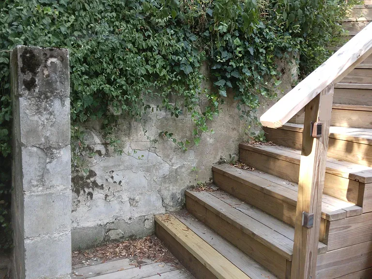 Climbing several flights of stairs required to reach the house.