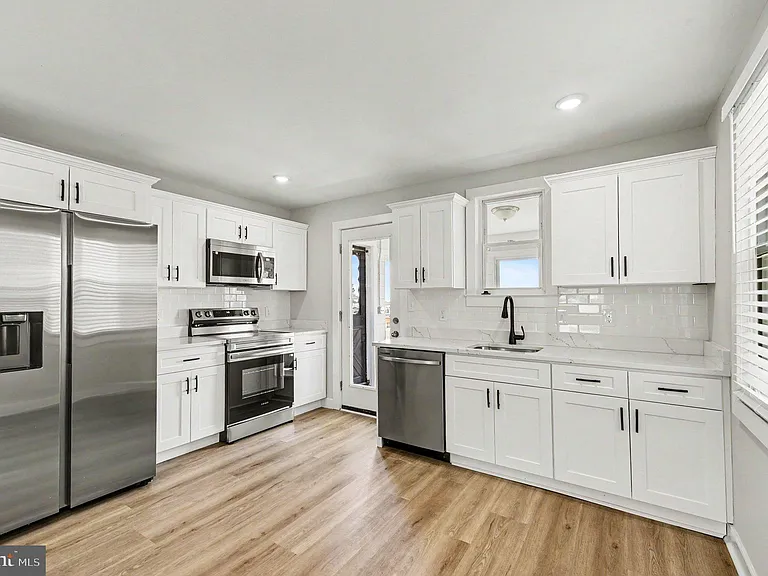 9135 Cuckold Point Rd — Photo 30