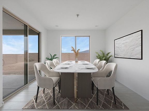 Naturally lit dining area with access to backyard