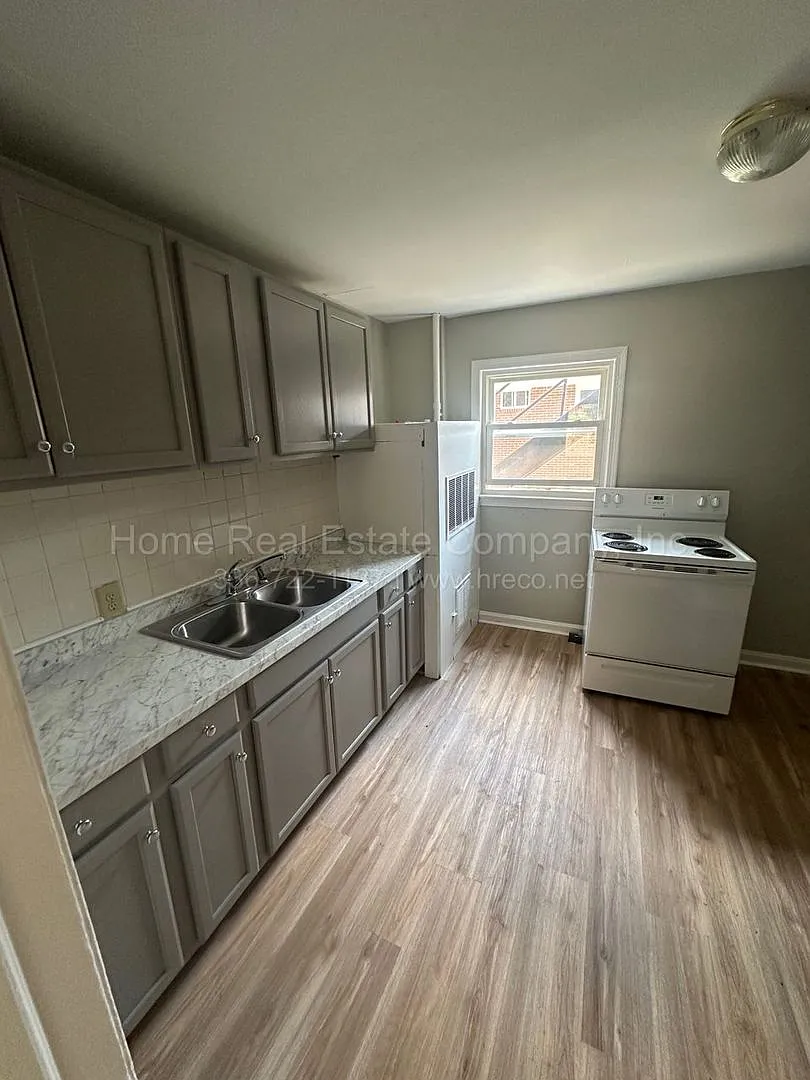 Building Photo - 1443 Clark Ave #A