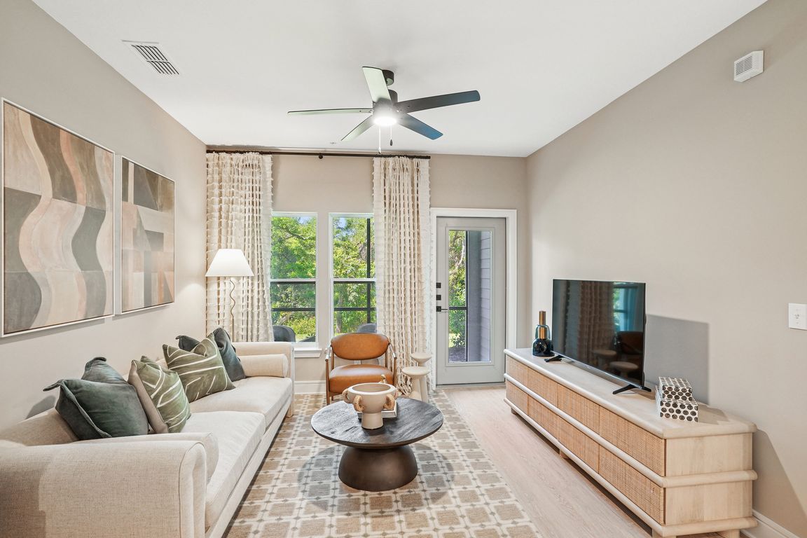 Spacious Living Room with Balcony/Patio Access