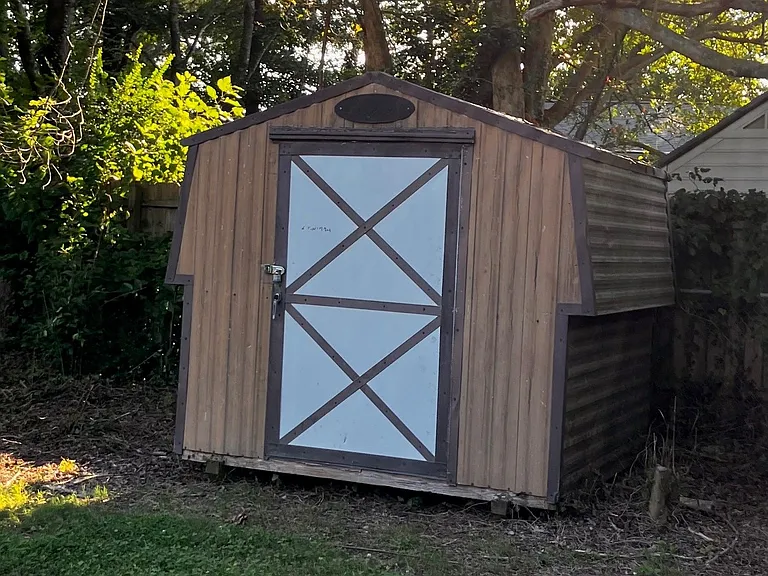 Storage shed with lock.