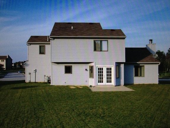 Large back yard with patio