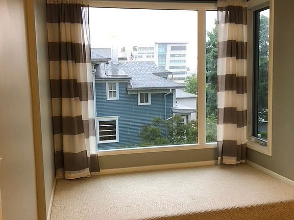 Living Room w/ picture window alcove, ideal for a nesting spot.