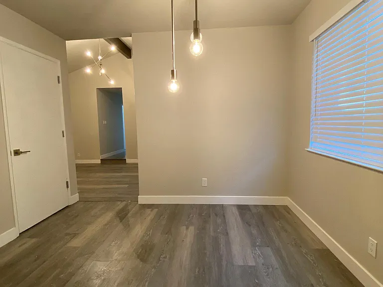 Door entry to garage from dining and living room area.
