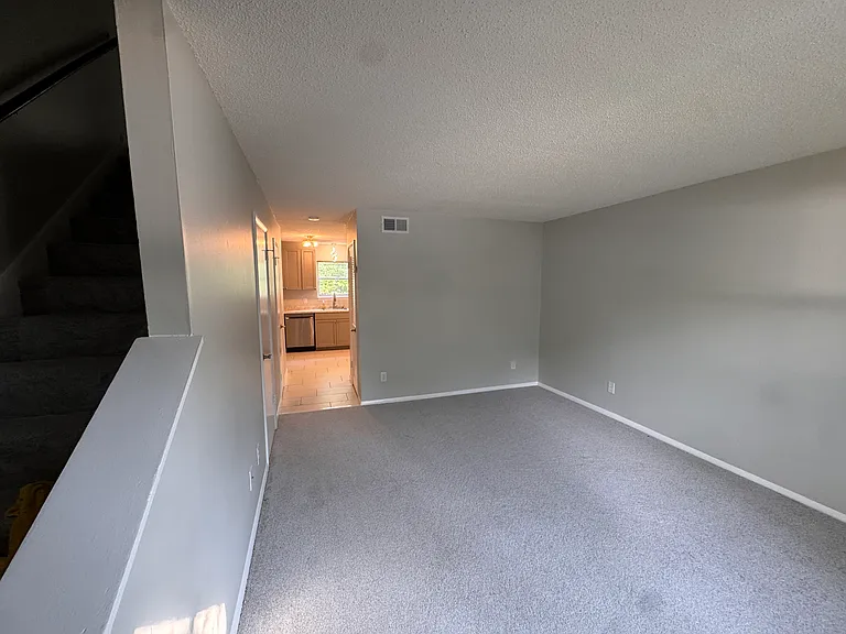 Living room looking to kitchen